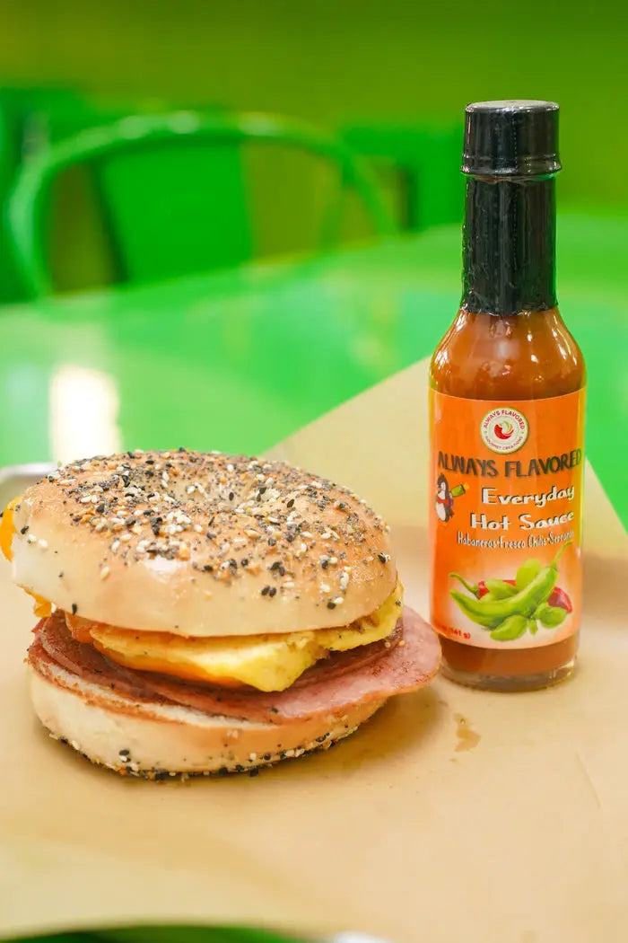 Breakfast sandwich with Always Flavored Everyday Hot Sauce at the Bistro